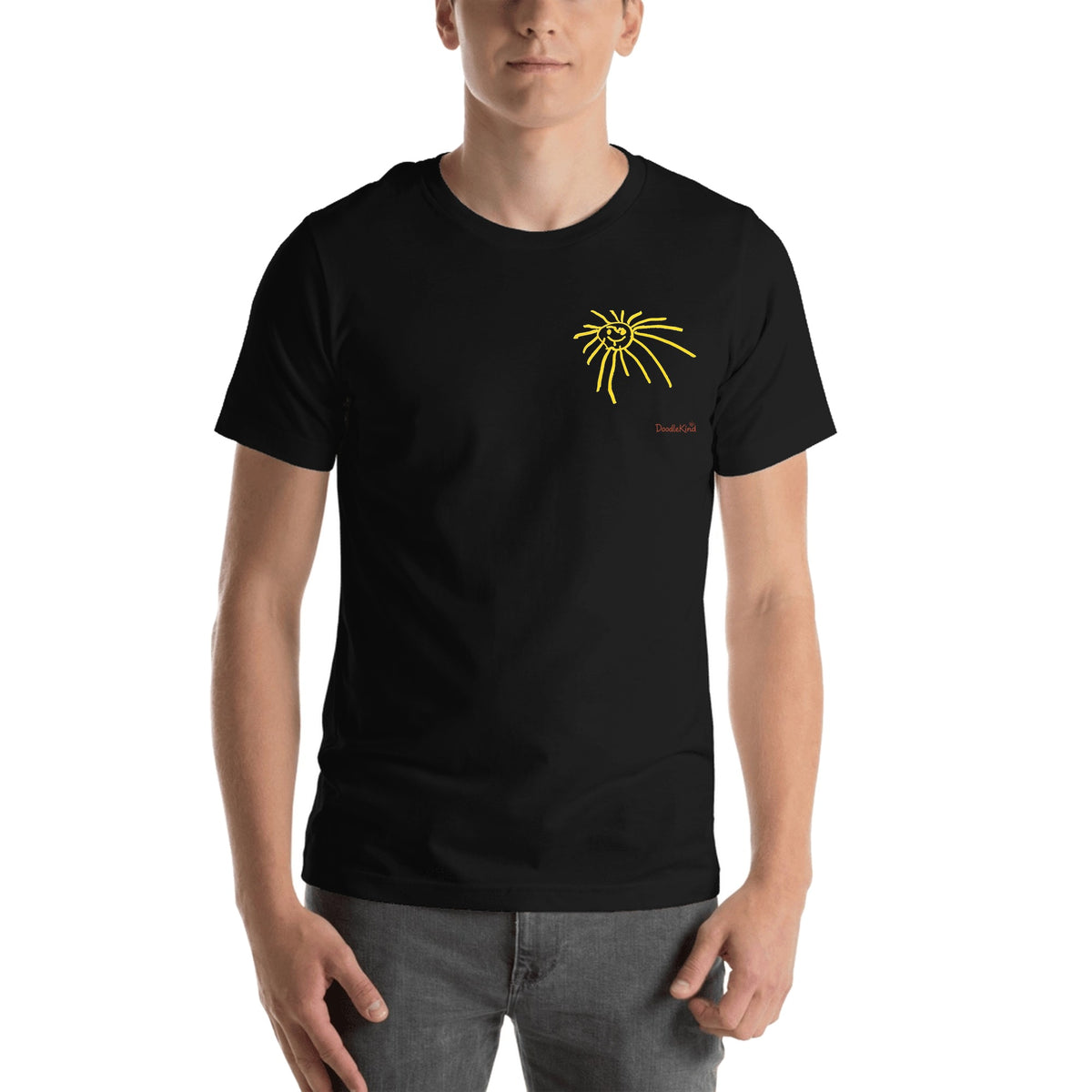 Your kid's drawing tee for grown-ups in black: the same drawing as a small left chest print with a tiny DoodleKind signature in the bottom right corner.